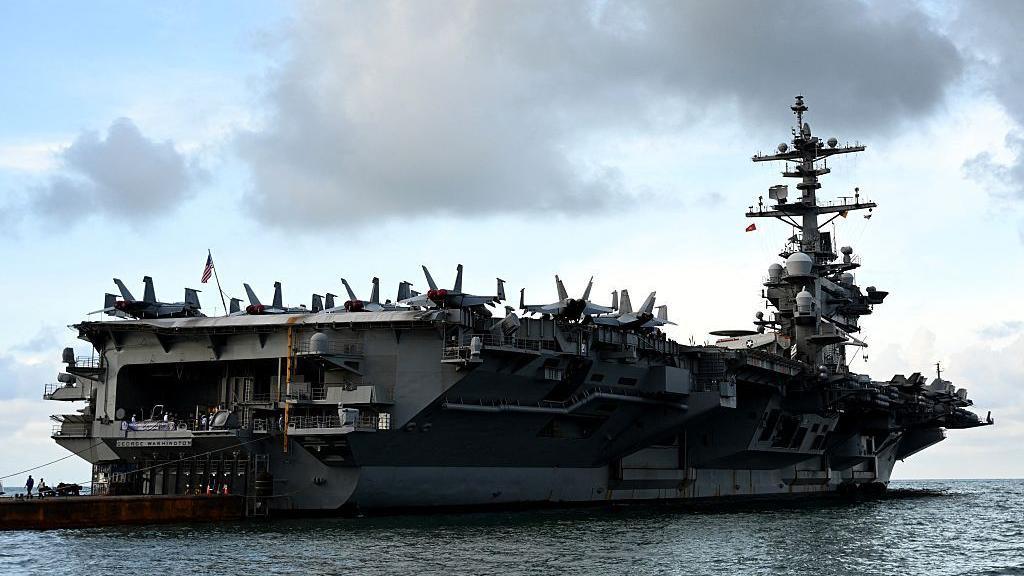 USS George Washington sails to relieve Lincoln amid crew crisis