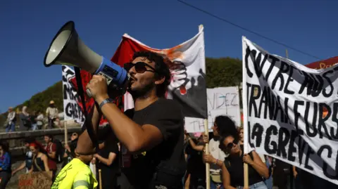 France's Workers Unite: Nationwide Strikes Against Budget Cuts