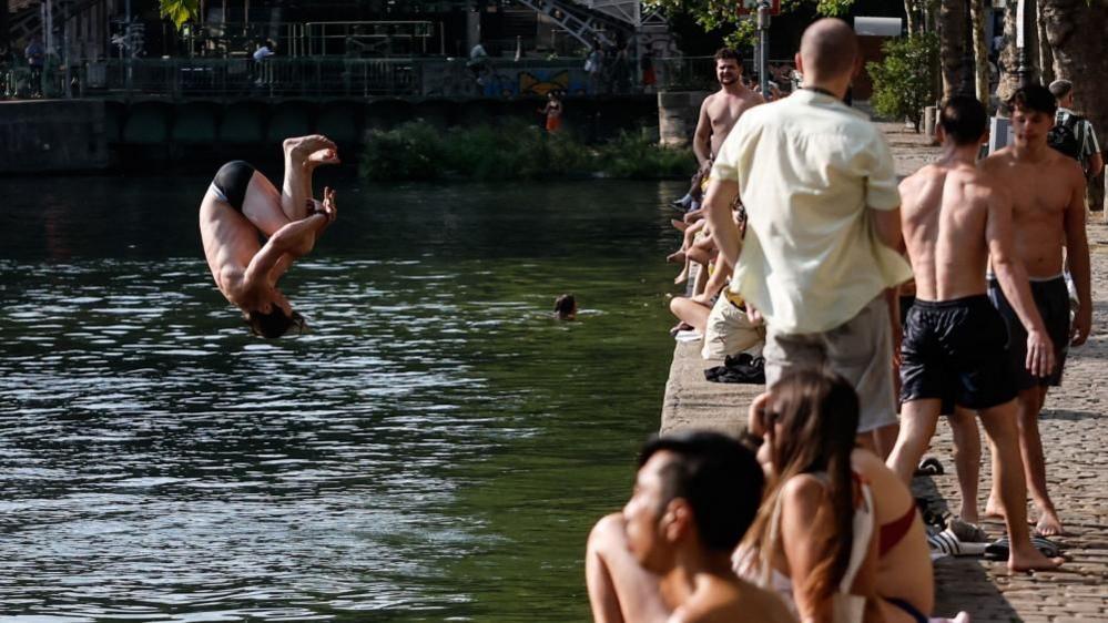 Heatwaves Surge Drownings in France – Indigenous Water Safety Lessons