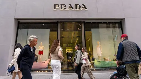 Prada Acquires Versace: A Strategic Move Amid Market Challenges