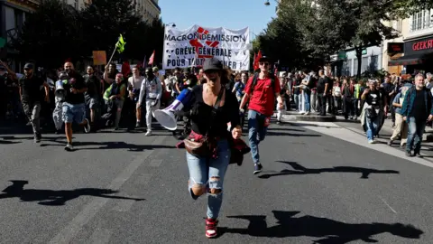 Protests Erupt in France as Workers Strike Against Budget Cuts