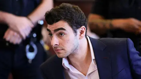 Alleged Impersonator Arrested While Attempting to Free Crime Suspect