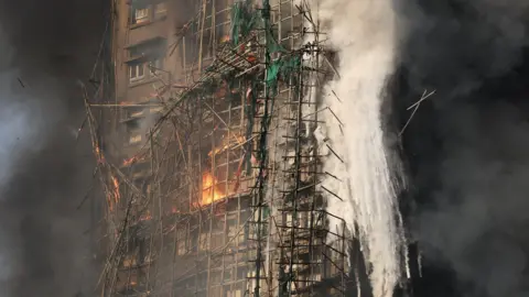 Hong Kong Communities in Mourning: Unraveling the Tragic Tower Block Fire