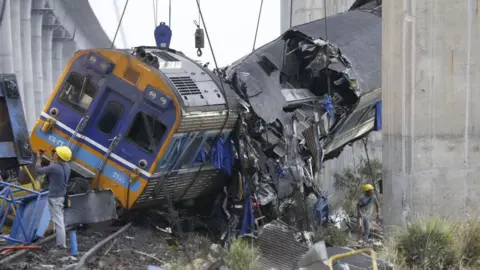Tragedy Strikes as Construction Crane Collapses onto Train in Thailand