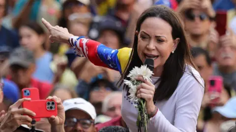 Venezuelan Opposition Leader Faces Threat of Arrest Amid Nobel Peace Prize Recognition
