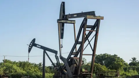 US Threatens Action Against Russian-Flagged Oil Tanker Amid Sanction Tensions