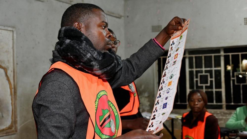 Zambia suspends vote tally after alleged attacks on polling staff