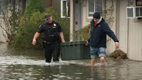Record Flooding Prompts Evacuations in Pacific Northwest